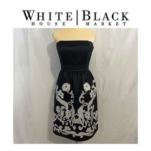 WHBM strapless black cocktail dress with white floral appliqué.  Size 8